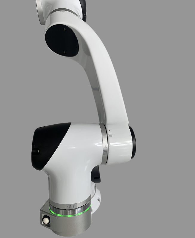 Braccio industriale del manipolatore robot che impila sistema per la macchina utensile che carica scaricando processo